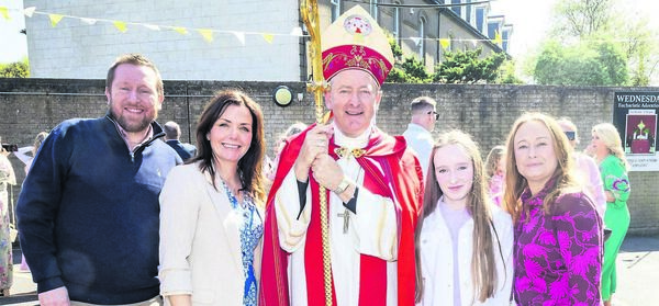 Erin Healy, St. John of God, who was confirmed by Bishop Alphonsus Cullinan at St. Joseph &amp; Benildus Church. 	All Photos: Joe Evans