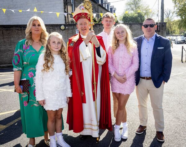 Twins, Sommer and Lily Tubbritt, St. John of God who were confirmed by Bishop Alphonsus Cullinan at St. Joseph &amp; Benildus Church. Photo: Joe Evans