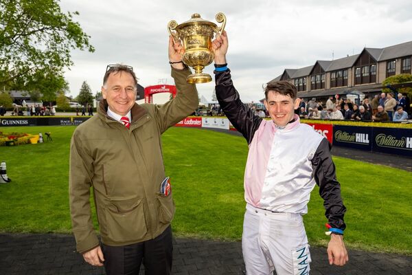 Trainer Henry de Bromhead and jockey Darragh O’Keeffe celebrate winning The Ladbrokes Champion Stayers Hurdle (Grade 1) with Bob Olinger.