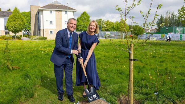 European Commissioner Michael McGrath and Professor Veronica Campbell, President of SETU, pictured at a tree-planting ceremony. 	Photo: Patrick Browne