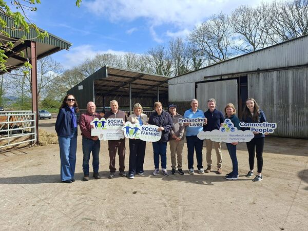 Residents of Seabreeze and Clinical Nurse Manager Willie Browne, Minister Mary Butler TD, Social Farmers Ger and Anne O'Grady, Waterford LEADER Partnership CEO Christine Rossi and Tanya Murphy, South East Regional Coordinator, Social Farming Ireland Waterford LEADER Partnership on Ger and Anne O'Grady's farm in Dungarvan.