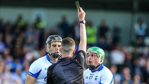 <p>Referee Sean Stack shows Waterford's Mark Fitzgerald a black card in a key moment in the Munster Senior Hurling Championship clash with Cork at Azzurri Walsh Park. Photo: INPHO</p>