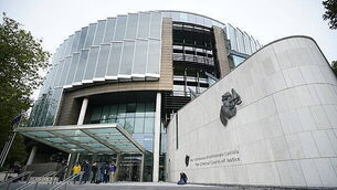 Anti-immigrant campaigner Derek Blighe charged with harassment of a garda