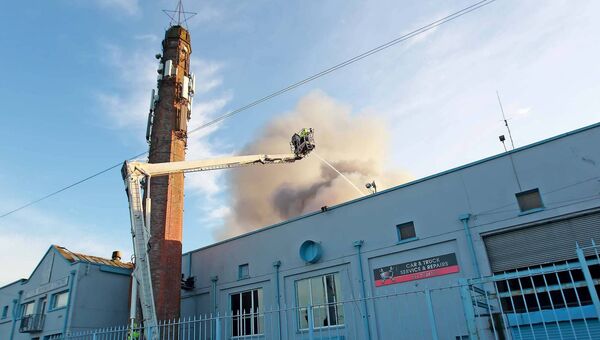 Smoke billows from the Tycor centre building in Waterford. Pic: Noel Browne Smoke billows from the Tycor centre building in Waterford. Pic: Noel Browne