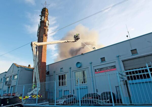 Smoke billows from the Tycor centre building in Waterford. Pic: Noel Browne