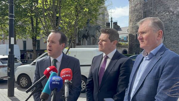 L-R: Waterford Minister of State John Cummins, Minister for Enterprise Peter Burke and Waterford Council Chief Executive Seán McKeown speak to members of the media.