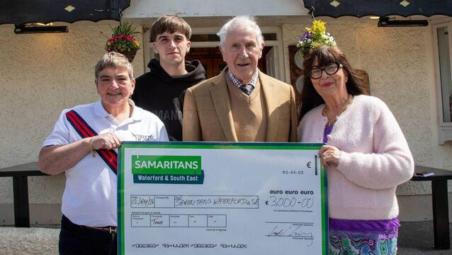 <p>Pictured are Sharon Kelly and Fintan Walsh (Swim Committee), along with Joshua McQuinn, The Spinnaker, presenting a cheque for €3,000 to Geraldine Guiry (Samaritans). Photo: John Power</p>