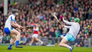 <p>Waterford forward Kevin Mahony beats Limerick goalkeeper Nickie Quaid with this shot during their Centra Munster Senior Hurling Championship clash played at the TUS Gaelic Grounds on Sunday last. Photos: INPHO/James Lawlor</p>
