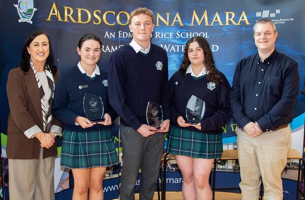 Pictured are Deputy Head Girl Chloe Webster, Deputy Head Boy Peter Breen and Deputy Head Girl Aine Groves who received awards at the recent Ardscoil Na Mara 6th Year Awards. Included are Ms. Power, Deputy Principal and . Photo: john Power