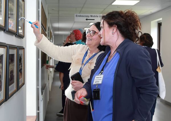 Niamh Sheehan (Director of Nursing, UHW) indicating where she appears on her year’s nurse graduation photo.