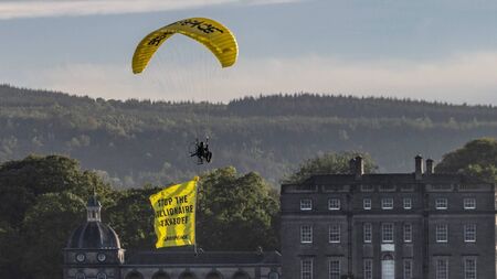 Greenpeace fly over Waterford Airport investor Kelcy Warren’s estate with sign: 'Stop the Billionaire Takeoff'