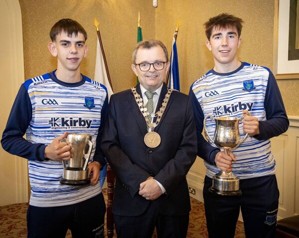 Mayor of Waterford City &amp; County Cllr Seamus Ryan, welcomed the Mount Sion CBS team to City Hall in recognition of their victory in the Niall McInerney Cup when they were crowned All Ireland Senior D Hurling champions and is pictured here with Aaron Mackey and Bradley Penkert. 