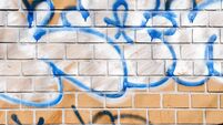 Council properties defaced with threatening graffiti messages