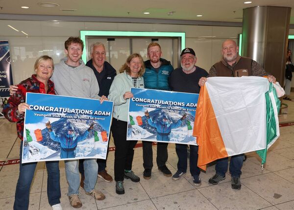 Family and friends welcome back Irish Everest expedition youngest team member Adam Sweeney as he arrived home at Dublin Airport after successfully summiting Mount Everest. Picture: Brian McEvoy