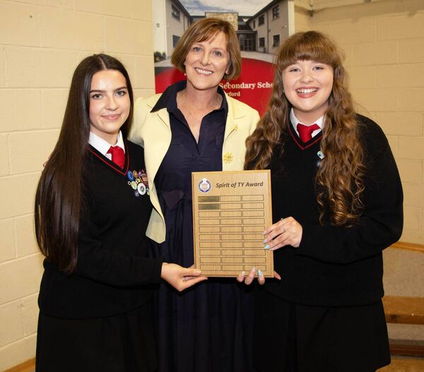 Recipients of the Spirit of TY award, Hannah and Leah, are pictured with school principal Sally Ronayne. Photo: John Power