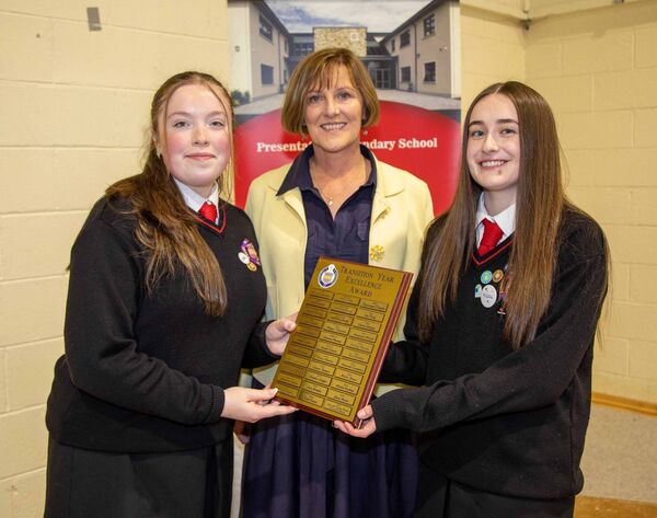 Elodie and Leah, recipients of the Excellence in TY award pictured with school principal Sally Ronayne. Photo: John Power