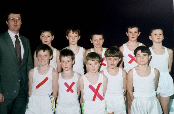 Tim O'Byrne with young gymnasts at the 1991/92 Mount Sion Primary school concert. Tim O'Byrne with young gymnasts at the 1991/92 Mount Sion Primary school concert.