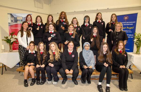 TY students receiving their Cupla Focal are pictured with Irish teachers Kate Batan, Doireann Mullane, and school principal Sally Ronayne. Photo: John Power TY students receiving their Cupla Focal are pictured with Irish teachers Kate Batan, Doireann Mullane, and school principal Sally Ronayne. Photo: John Power