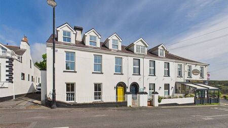Waterford Property: Substantial Dunmore East home overlooking seaside village