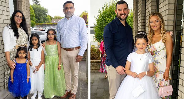  Phea Pratheeish, (left), and Layna Crosby, (right), St. Ursula's, who received her First Holy Communion at the Sacred Heart Church.