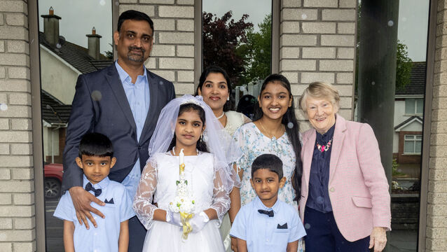 <p> Jovana Justin, St. Ursula's, who received her First Holy Communion at the Sacred Heart Church. 	All Photos: Joe Evans</p>