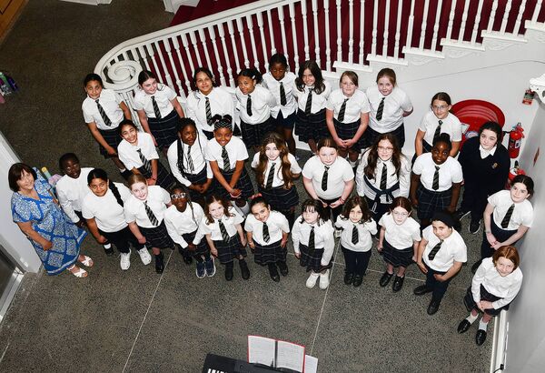 Choir from 4th and 5th Class Pupils, Our Lady of Mercy with Ms. Sinéad O'Carroll, Choir Director.