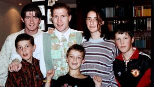 <p>Members of the Tracey family John, James, Eileen, Patrick and Michael, pictured with Olympic Gold Medallist Michael Carruth when he officially opened the new Olympus Nite Club back in 1992.</p>
