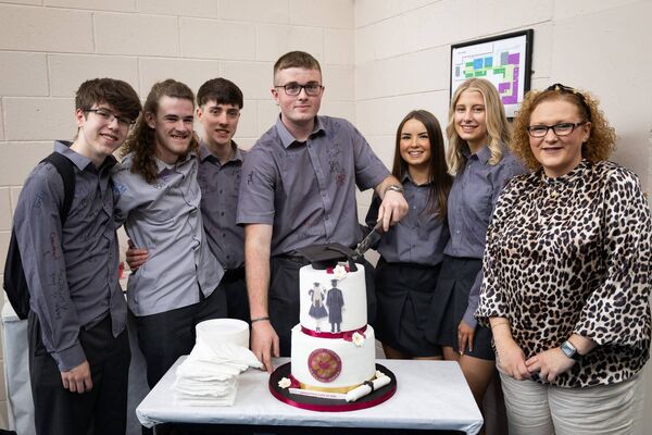 Eanna Power, Jack Galvin, Ben Conway, James Drohan, Laura Carlin and Christine Crowley, cutting cake with Ms Ui Chathain. Eanna Power, Jack Galvin, Ben Conway, James Drohan, Laura Carlin and Christine Crowley, cutting cake with Ms Ui Chathain.