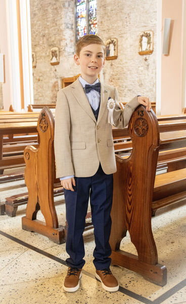  Rowan Hurley, St. Declan's, who received his First Holy Communion at St. John's Church.