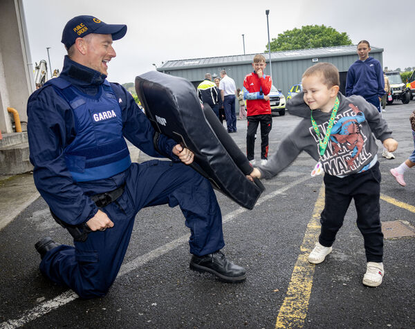 Garda Iain O'Byrne and Hutson, pictured at the Waterford Garda Station open day. Garda Iain O'Byrne and Hutson, pictured at the Waterford Garda Station open day.