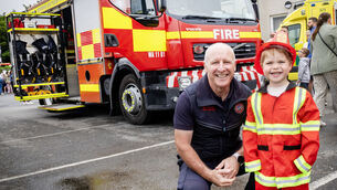 <p> Fire Fighter John Harte with Oliver, pictured at the Waterford Garda Station open day. All Photos: Joe Evans</p> <p> Fire Fighter John Harte with Oliver, pictured at the Waterford Garda Station open day. All Photos: Joe Evans</p>