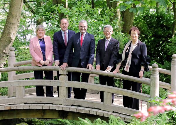 Agnes Aylward, Chairperson and founder of the gardens is pictured on the Sori Bashi Bridge at Lafcadio Hearn Japanese Gardens with Mary Butler TD, Government Chief Whip and Minister of State at the Department of Health, Minister of State at the Department of Housing, Local Government and Heritage, John Cummins TD, Minister Dara Calleary T.D, Minister for Rural and Community Development and the Gaeltacht & Minister for Social Protection and His Excellency, Ambassador Miyagawa, Japan’s Ambassador to Ireland at the official opening of the Kokoro Heritage Centre and Cafe at the Lafcadio Hearn Japanese Gardens. Pic: Noel Browne Agnes Aylward, Chairperson and founder of the gardens is pictured on the Sori Bashi Bridge at Lafcadio Hearn Japanese Gardens with Mary Butler TD, Government Chief Whip and Minister of State at the Department of Health, Minister of State at the Department of Housing, Local Government and Heritage, John Cummins TD, Minister Dara Calleary T.D, Minister for Rural and Community Development and the Gaeltacht & Minister for Social Protection and His Excellency, Ambassador Miyagawa, Japan’s Ambassador to Ireland at the official opening of the Kokoro Heritage Centre and Cafe at the Lafcadio Hearn Japanese Gardens. Pic: Noel Browne