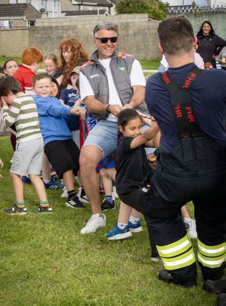 Taking part in the Tug-O-War. Taking part in the Tug-O-War.