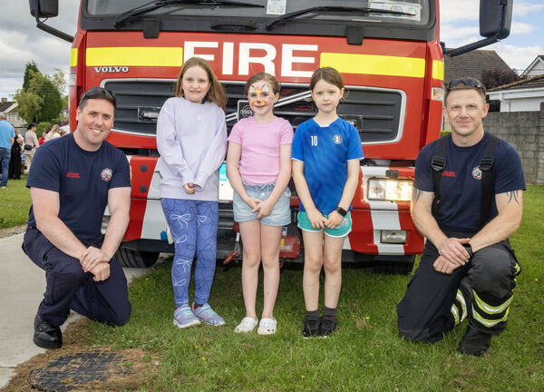Fire Fighters Shane Kavanagh and Chris Kenneally with Evie, Freya and Aria at Lismore Park Green for the Playful Communities Fun Evening. Fire Fighters Shane Kavanagh and Chris Kenneally with Evie, Freya and Aria at Lismore Park Green for the Playful Communities Fun Evening.