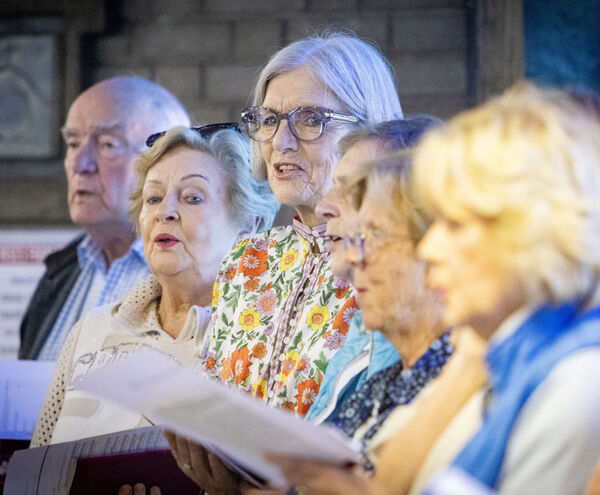 Choir members sing during the Pentecost Mass. Choir members sing during the Pentecost Mass.