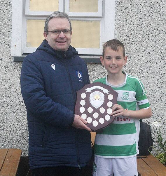 David Cullen of the WSFL presents the U12A League trophy to Villa captain Jack Flynn. Photos: Paul Elliott David Cullen of the WSFL presents the U12A League trophy to Villa captain Jack Flynn. Photos: Paul Elliott