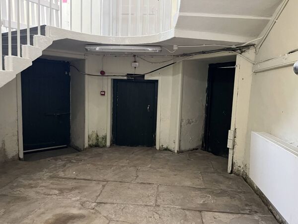 The original doors and floor to the prison cells at Grangegorman. The original doors and floor to the prison cells at Grangegorman.
