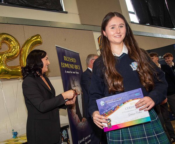 Grainne Collins receiving her graduation certificate. Photo: John Power Grainne Collins receiving her graduation certificate. Photo: John Power