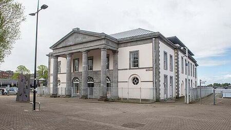 Video played in court of man being attacked with gun and sword during burglary