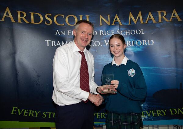 Jun. POY Girls Athletics Niamh McGrath. Presenting is Mr. Cahill, Deputy Principal. Photo: John Power Jun. POY Girls Athletics Niamh McGrath. Presenting is Mr. Cahill, Deputy Principal. Photo: John Power