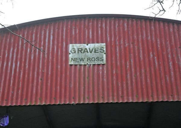 A farm building at Fethard-on-Sea, Co Wexford, still with a ‘Graves New Ross’ sign. Photo: Liam Ryan