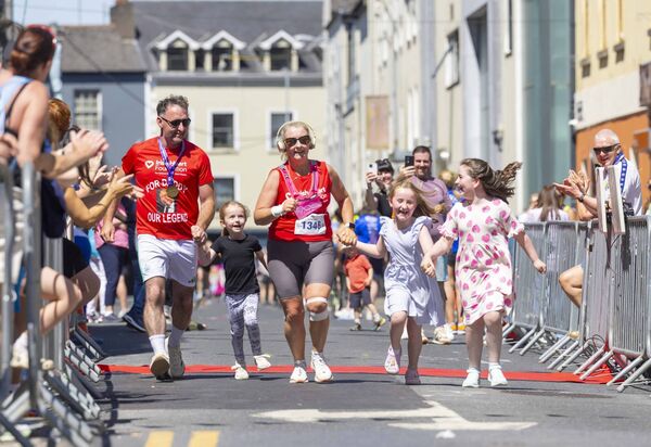 Pictured at the WLR Waterford Viking Marathon 2026 are brother and sister Martin Carroll and Alma Carroll nearing the finish where they were joined by Eve, Holly and Ava carroll. Photograph: Patrick Browne Pictured at the WLR Waterford Viking Marathon 2026 are brother and sister Martin Carroll and Alma Carroll nearing the finish where they were joined by Eve, Holly and Ava carroll. Photograph: Patrick Browne