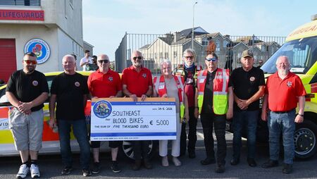 Motorbike enthusiasts present cheques following successful fundraiser in Waterford