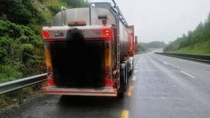 <p>The driver of this truck was holding a mobile phone while driving. Pic: An Garda Síochána Waterford FB</p>