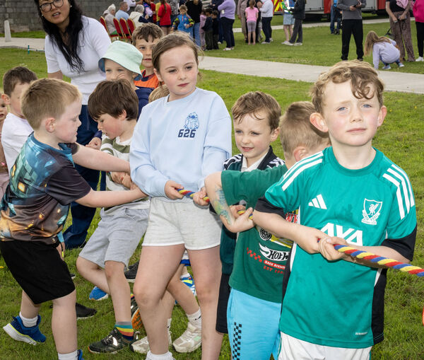  Taking part in the Tug-O-War at Lismore Park Green.