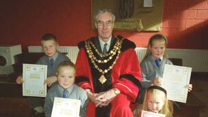 <p>Mayor of Waterford Ald. Davy Daniels presented School Attendance Certificates to the pupils of St. Saviour's Primary School Ballybeg back in 2000. </p>