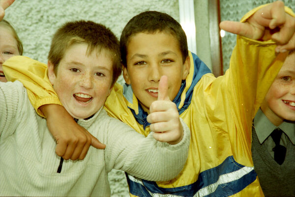  Children from St. Saviour's Primary School show their excitement as they await the arrival of President McAleese in Ballybeg back in 2000.