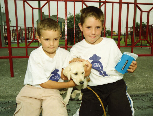  Darragh and Tommy Carroll, Norwood Litter Rangers, with their dog Bonnie, who they were going to clean up after with the Pooper Scooper they received during WLR FM Waterford Environmental Week back in 2000.