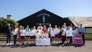 <p>Pictured at Scoil Mhuire Butlerstown, Co. Waterford, from left to right, are Craig McNamara, DreamDev; Sandra Dinan, National Broadband Ireland (NBI); Diana O'Neill, School Secretary; Daragh O'Mahony, NBI; Maria O'Connor, Principal; Cllr Declan Barry, representing the Mayor of Waterford; Michael Kelleher, Learning Support Teacher; Ciara Malone, Work Experience Student, NBI; Rachel Kiely, Waterford City and County Council; Jerry O'Sullivan, Entegro; and students of Scoil Mhuire Butlerstown.</p>