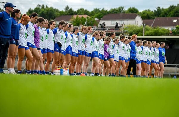 The Waterford team during the playing of the National Anthem before the LGFA TG4 All-Ireland Senior Championship round 3 match against Armagh played at BOX-IT Athletic Grounds. Photos: Sportsfile/Ramsey Cardy